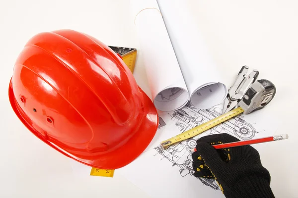 Hardhat on blueprint — Stock Photo, Image