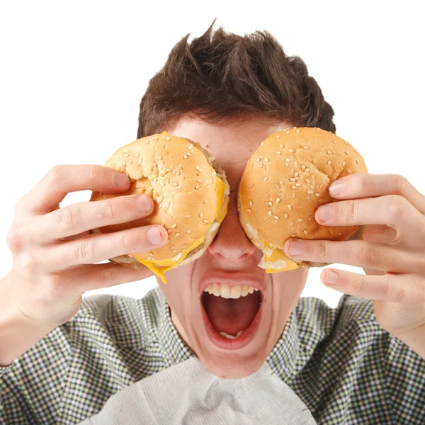 Hombre comiendo hamburguesa — Foto de Stock