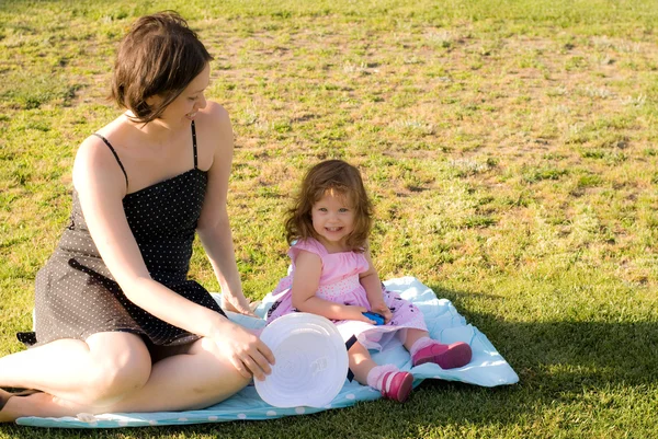 The little girl play with her mother — Stock Photo, Image