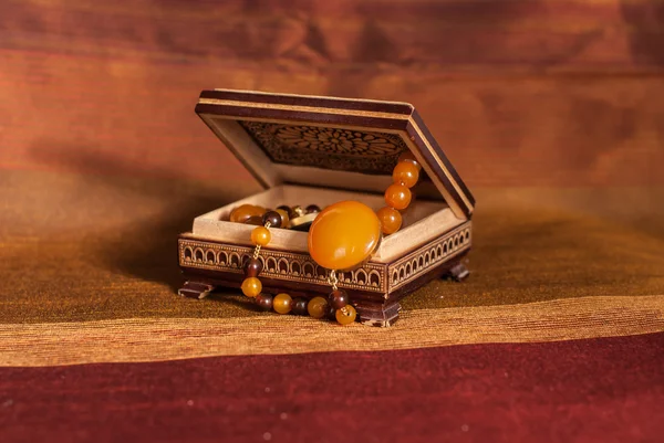 Amber necklace in box — Stock Photo, Image