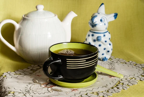 Big mug with tea — Stock Photo, Image