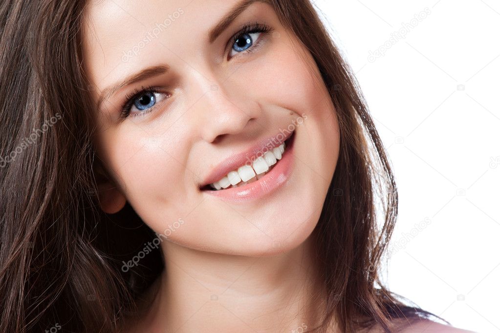 Portrait of young beautiful woman with perfect smile
