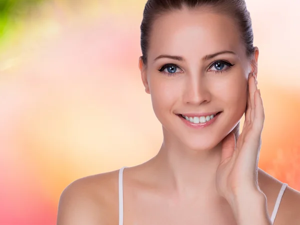 Beautiful face of young adult woman with clean fresh skin — Stock Photo, Image