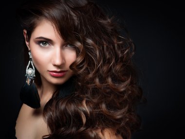 Beautiful woman with evening make-up. Jewelry and Beauty. Fashion photo clipart