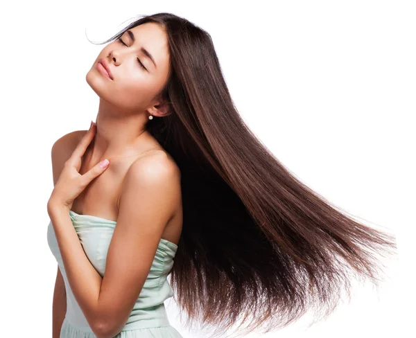 Retrato de uma bela jovem com cabelo voando — Fotografia de Stock