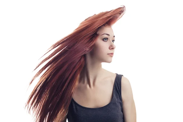 Menina com cabelo voador isolado sobre fundo branco — Fotografia de Stock