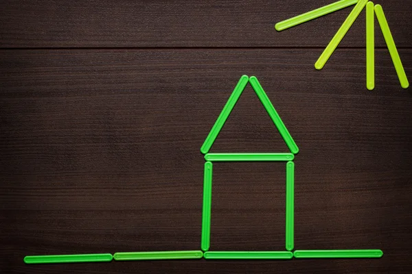 Concept van huis gevormd met het tellen van stokken — Stockfoto