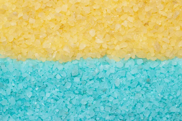 Fondo de sal de baño aromático azul y amarillo — Foto de Stock