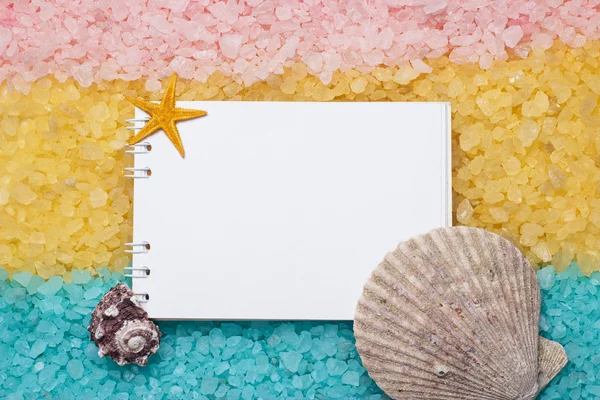 Bath salt, seashells and notebook background — Stock Photo, Image
