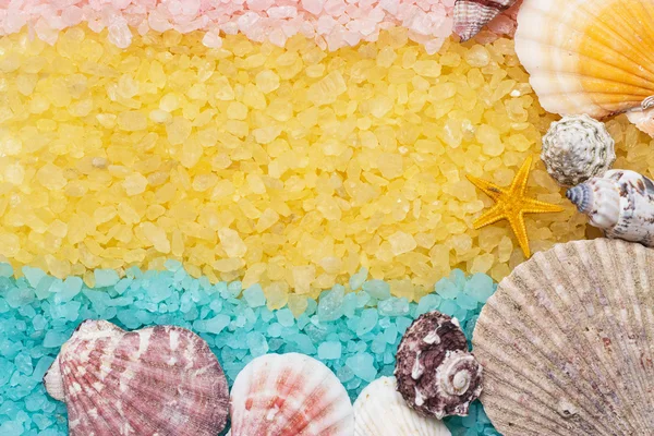 Blue yellow pink bath salt and seashells — Stock Photo, Image
