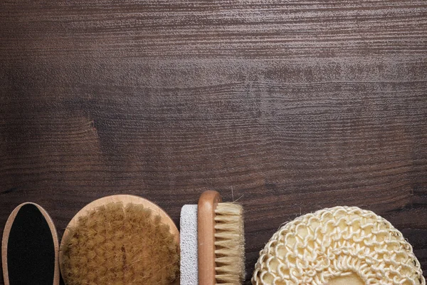 Some bath accessories on wooden background — Stock Photo, Image