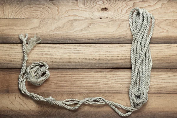 Antiguo fondo de madera con cuerda de barco — Foto de Stock