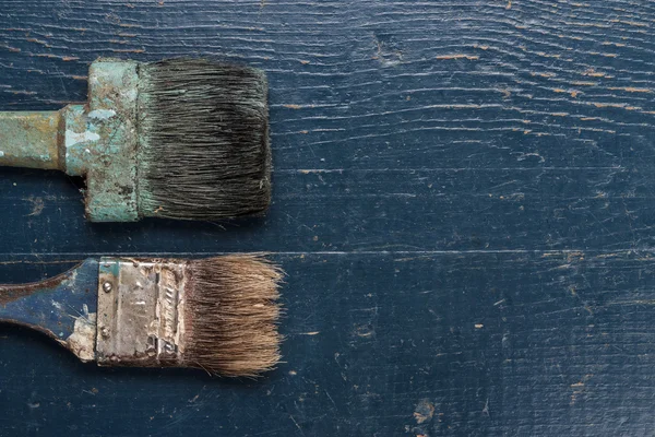 Old brushes on the table — Stock Photo, Image