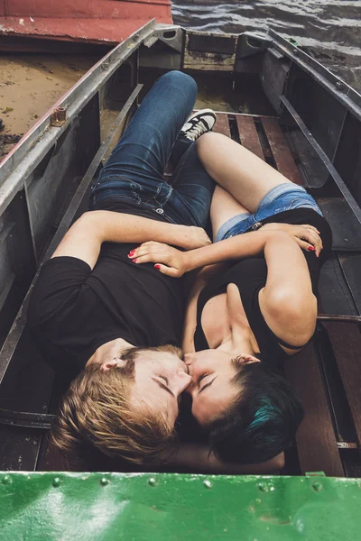 Happy loving couple in the boat — Stock Photo, Image