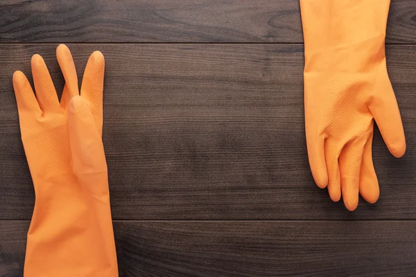 Πορτοκαλί καουτσούκ καθαρισμού γάντια — Φωτογραφία Αρχείου