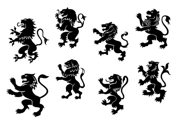 Leones negros heráldicos reales — Vector de stock