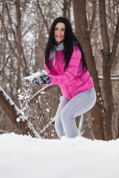 Girl playing  snowballs — Stock Photo, Image