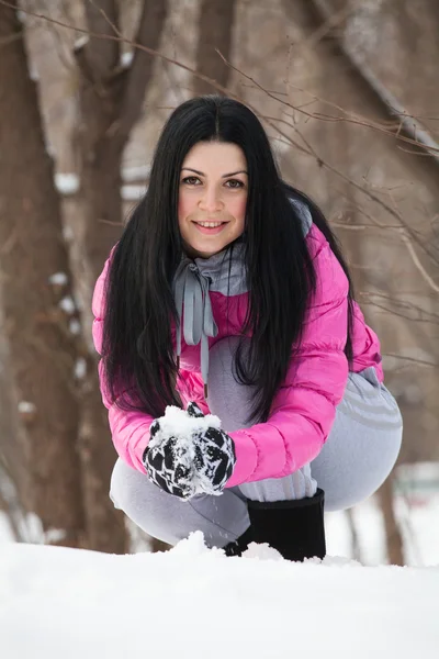 Girl playing  snowballs — Stock Photo, Image