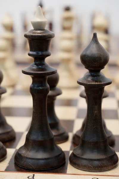 Schackbräde med schacket — Stockfoto