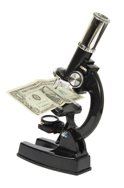 Mikroskop med dollar — Stockfoto