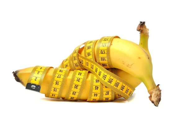 Bananas and measure tape — Stock Photo, Image