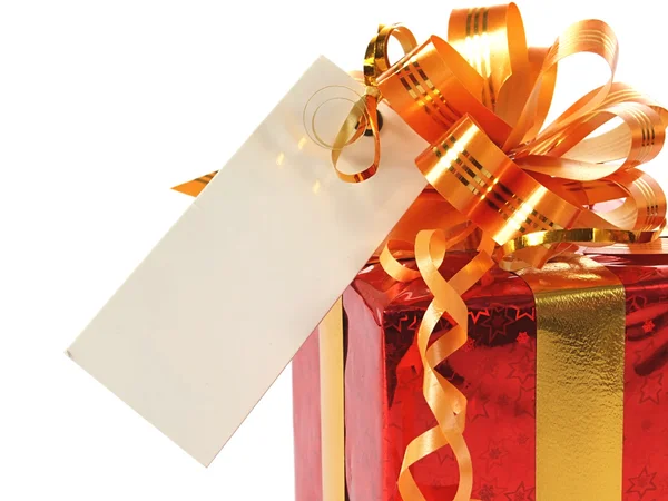 Red gift with blank tag — Stock Photo, Image