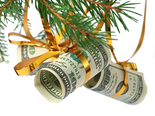 Dollars op kerstboom Stockfoto