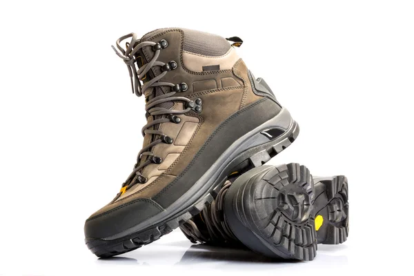 A pair of new hiking boots on white background — Stock Photo, Image