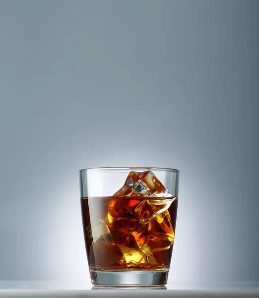 Whiskey with ice cubes — Stock Photo, Image