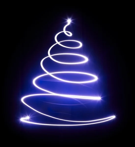 Árvore de Natal com luz e estrela azul . — Fotografia de Stock