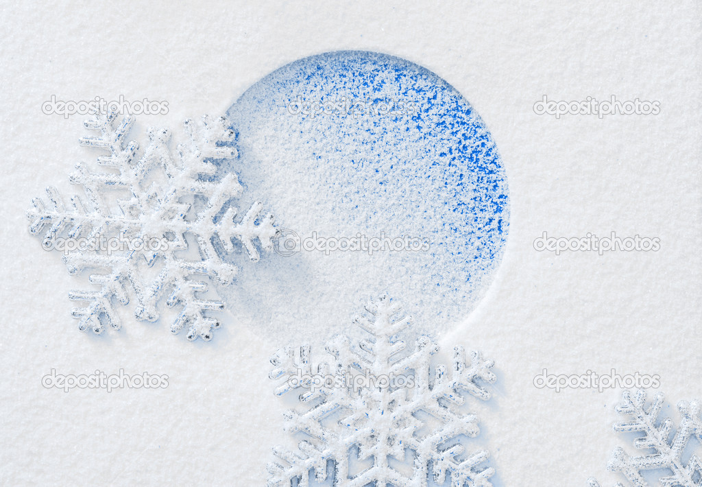 Snowflake on the snow.