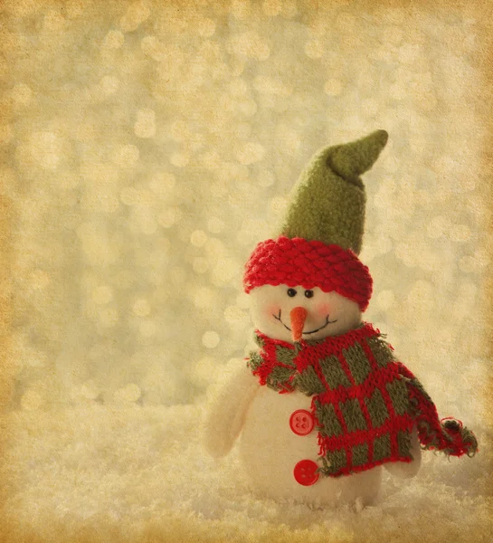 Retro bild med glad snögubbe. — Stockfoto