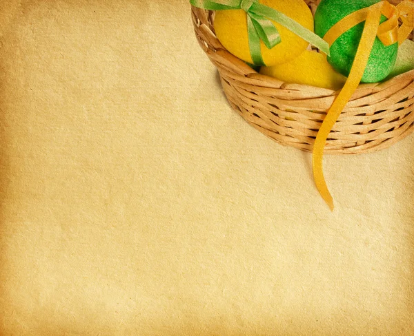 Painted easter eggs in basket — Stock Photo, Image