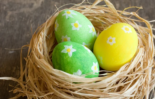 Easter eggs  in the straw — Stock Photo, Image
