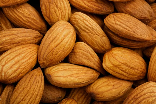 Detailní záběr na celou mandlí ořechy — Stock fotografie