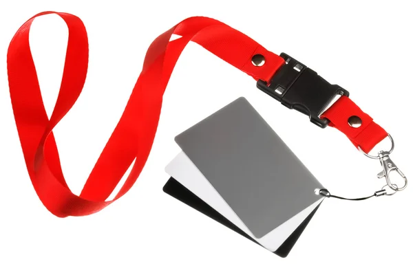 White balance cards on a red ribbon — Stock Photo, Image