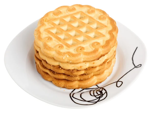 Stack of cookies on a white plate — Stock Photo, Image