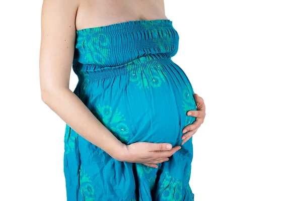 Grande barriga grávida com as mãos sobre ele — Fotografia de Stock