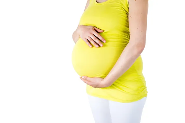 Pregnant belly with hands on it — Stock Photo, Image