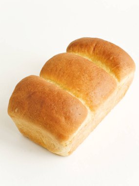 Taze pişmiş ev yapımı süt mayalı ekmek. Sığ dof.