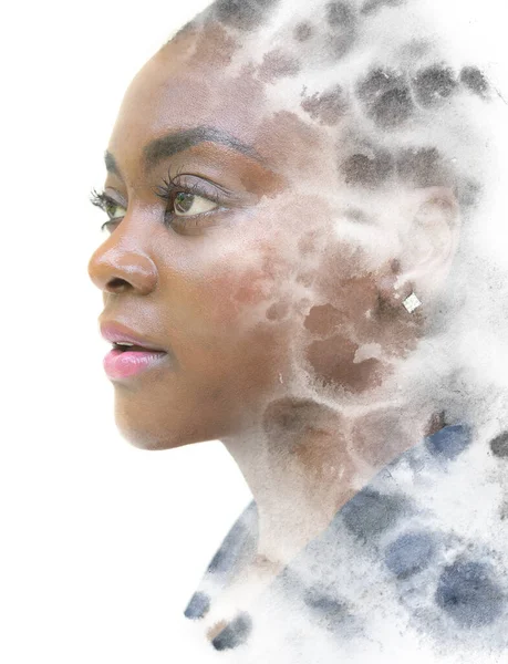 A portrait of an African American woman dissolving into various ink shapes. Paintography. — Stock Photo, Image