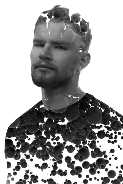 Ritratto in bianco e nero di un uomo combinato con molteplici sfere 3D fluenti. — Foto Stock