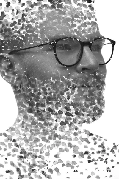 Måleri. Ett porträtt av en man kombinerat med olika bläckstänk. — Stockfoto