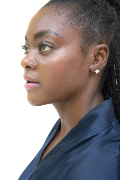 A portrait of a young woman against a white background. — Stock Photo, Image