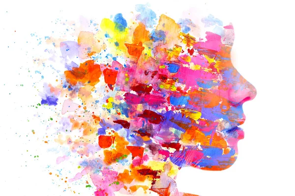 Um retrato de perfil de uma mulher combinada com vários respingos de aquarela coloridos. Pintografia. — Fotografia de Stock