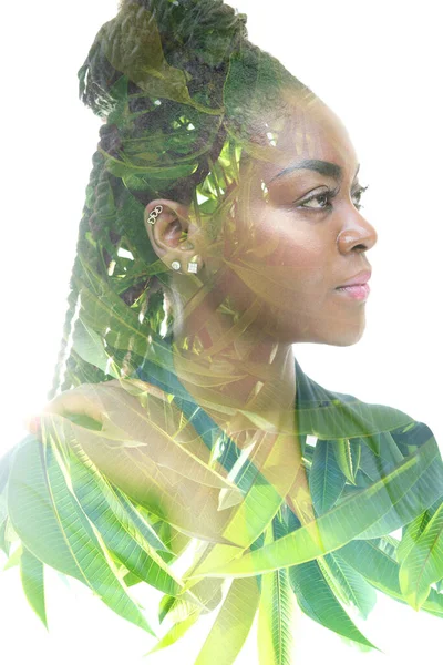 A portrait of a woman combined with wildflowers in a double exposure technique. Country life. — Stock Photo, Image