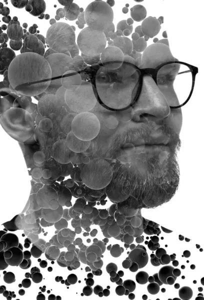 Een portret van een man gecombineerd met 3D-sferen in een dubbele belichtingstechniek. — Stockfoto