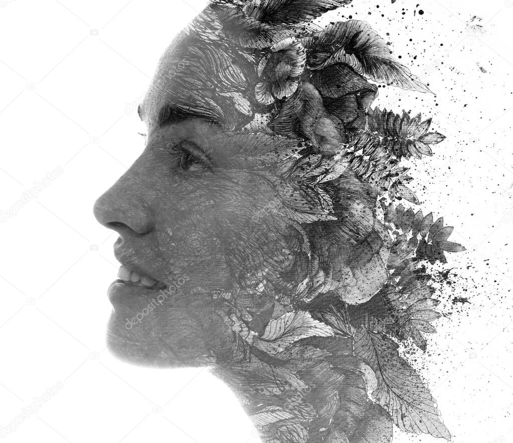 A profile portrait of a woman combined with a painting of leaves in a paintography technique.