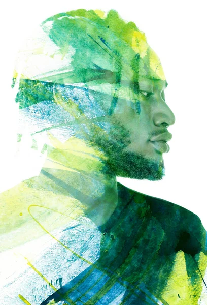 A profile portrait of a man combined with colorful paint strokes. Paintography. — Zdjęcie stockowe