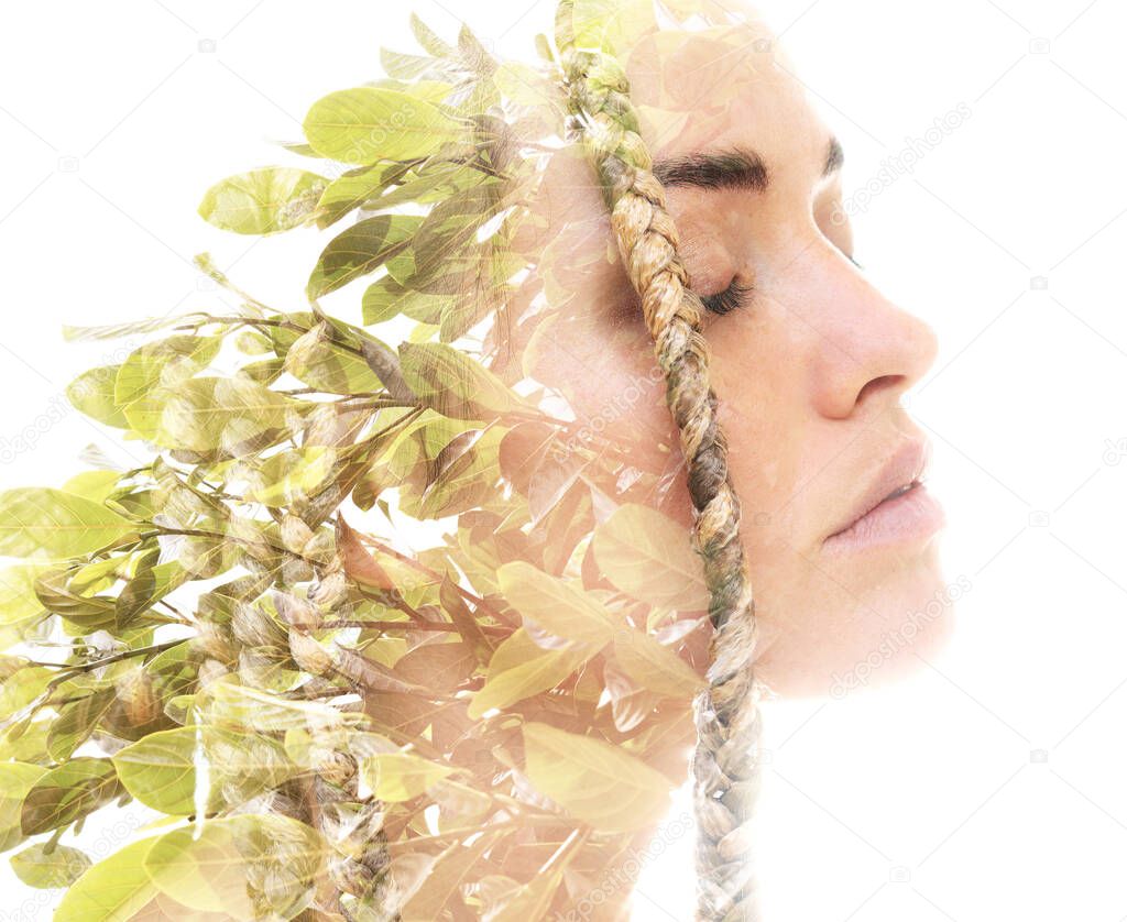 A portrait of a woman combined with wild nature in a double exposure technique.